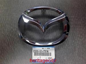 Emblemat na atrapę chłodnicy B63B50716 Mazda