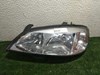 Reflektor lewy 93175368 OPEL